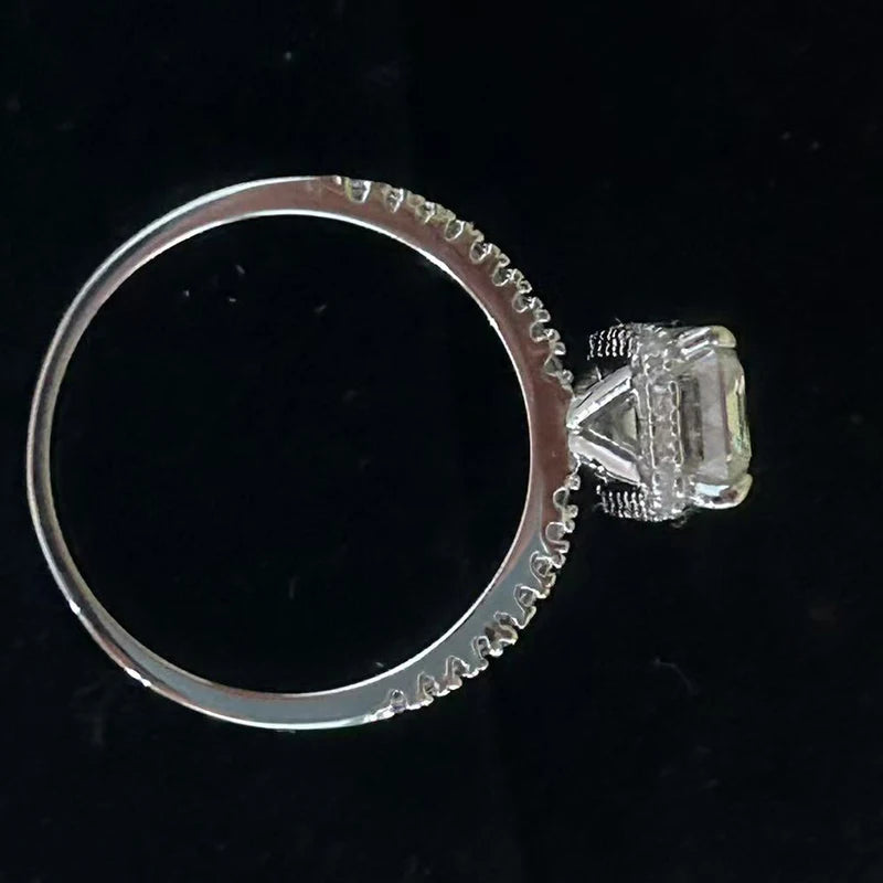 One piece of S925 sterling silver eternity ring set with a cushion-cut moissanite ranging from 1 to 4 carats, perfect for a wedd