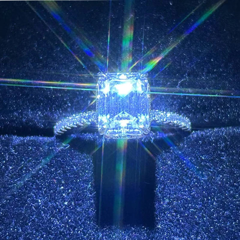 One piece of S925 sterling silver eternity ring set with a cushion-cut moissanite ranging from 1 to 4 carats, perfect for a wedd