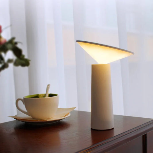 Nordic minimalist style table lamp with USB charging function for creative decoration of dining room and bedside.