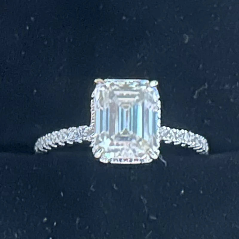 One piece of S925 sterling silver eternity ring set with a cushion-cut moissanite ranging from 1 to 4 carats, perfect for a wedd