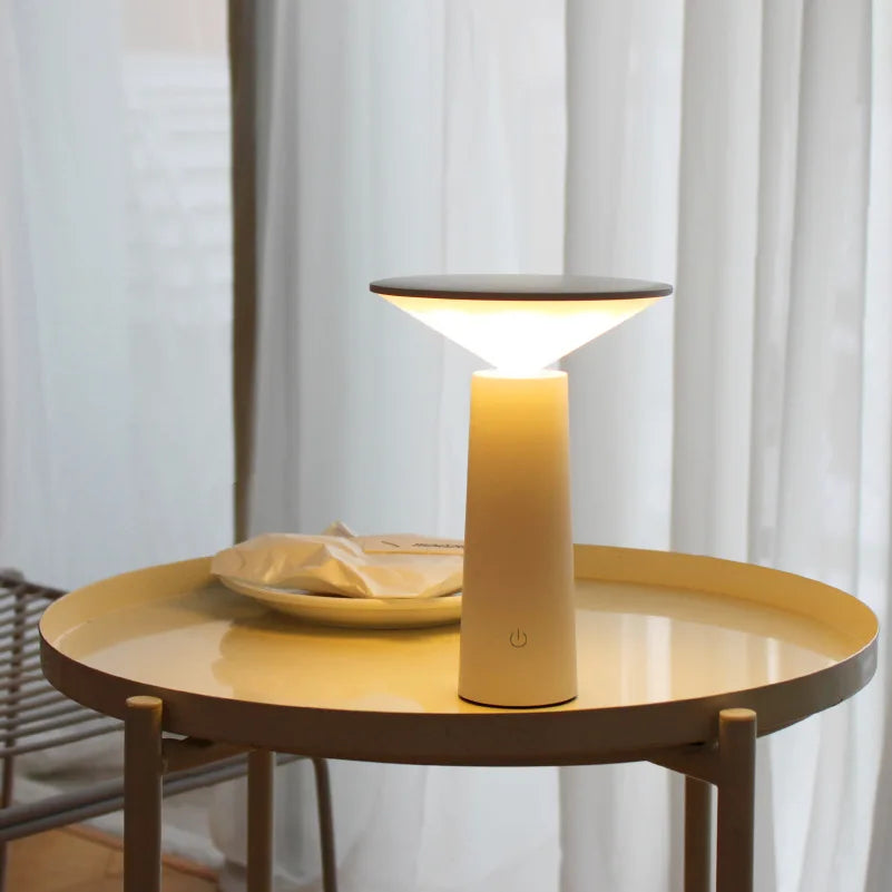 Nordic minimalist style table lamp with USB charging function for creative decoration of dining room and bedside.